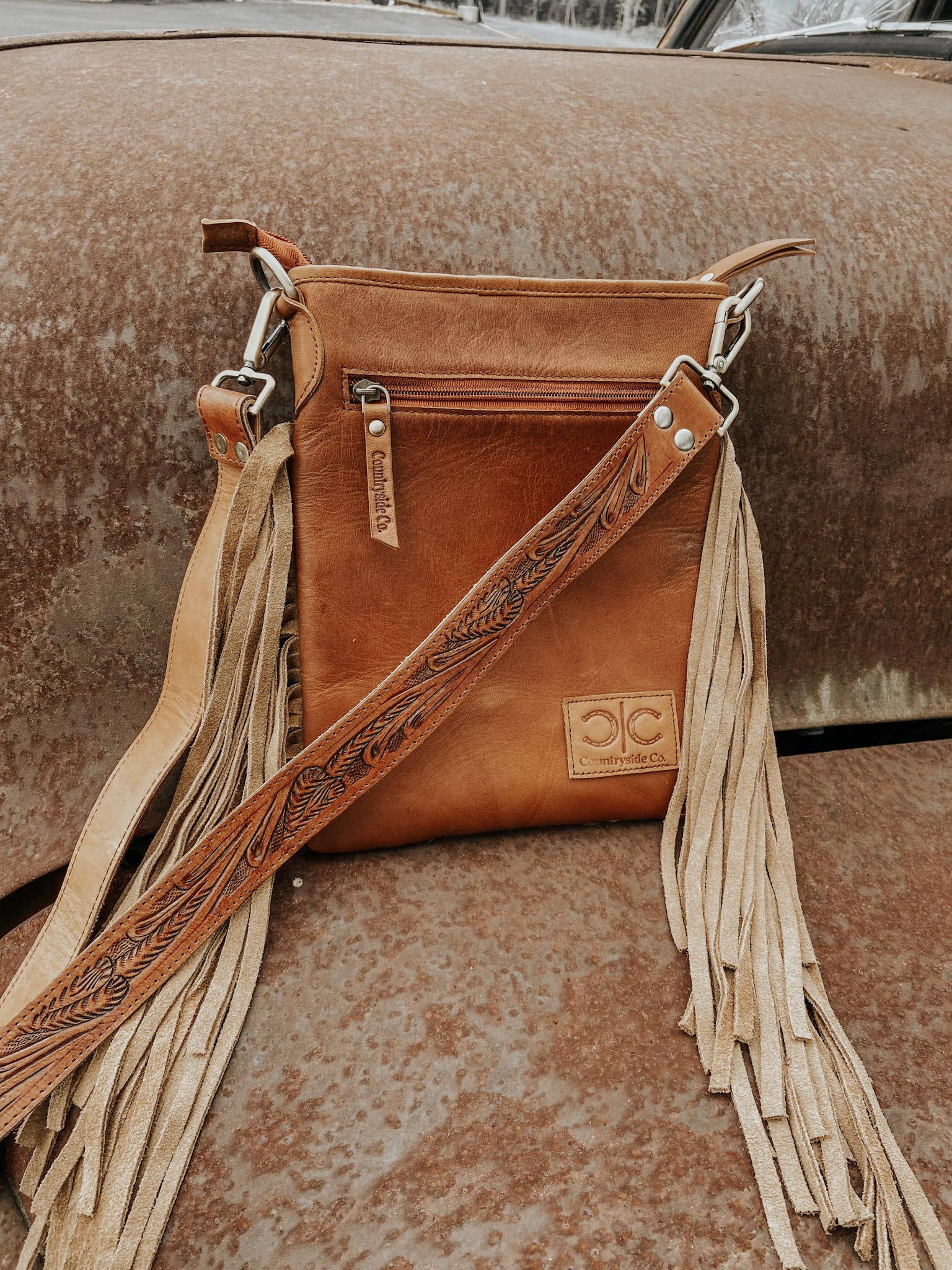 Showdown Cowhide Fringe Purse