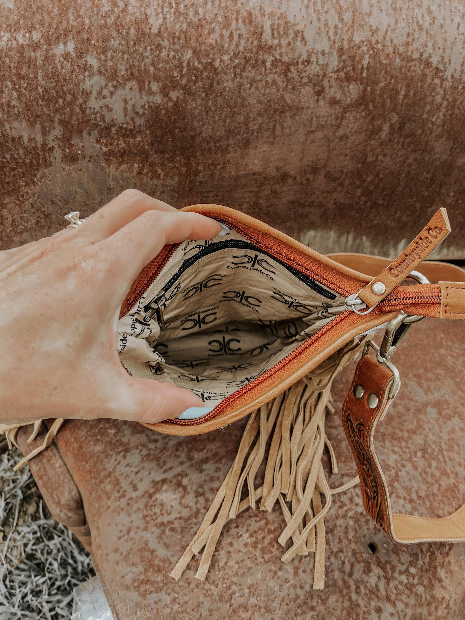 Showdown Cowhide Fringe Purse